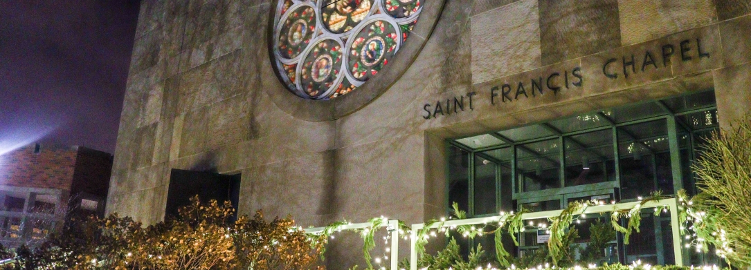 front of jcu saint francis chapel at night