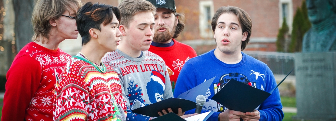 choir of students singing on campus for christmas events