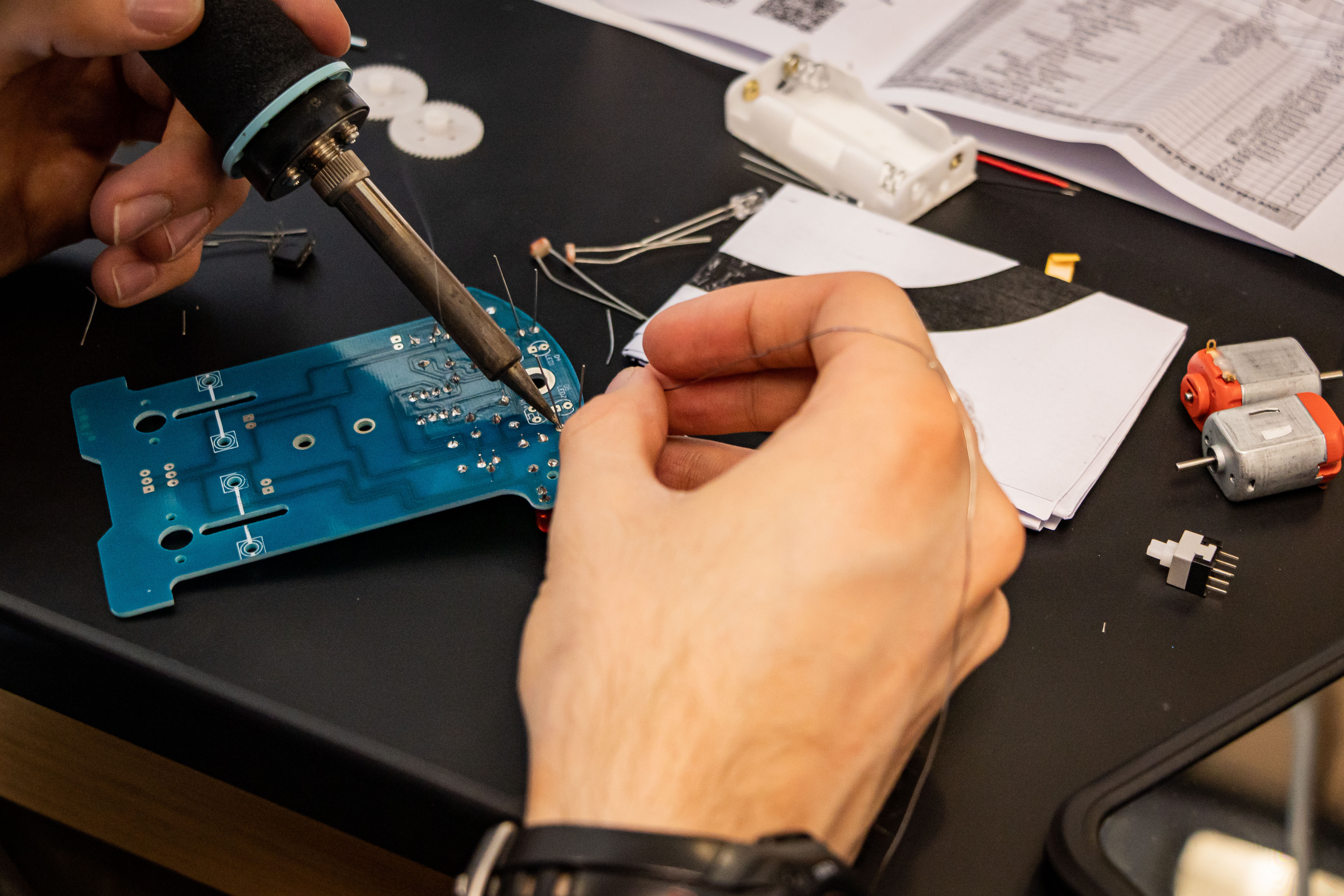 student doing electric panel wiring