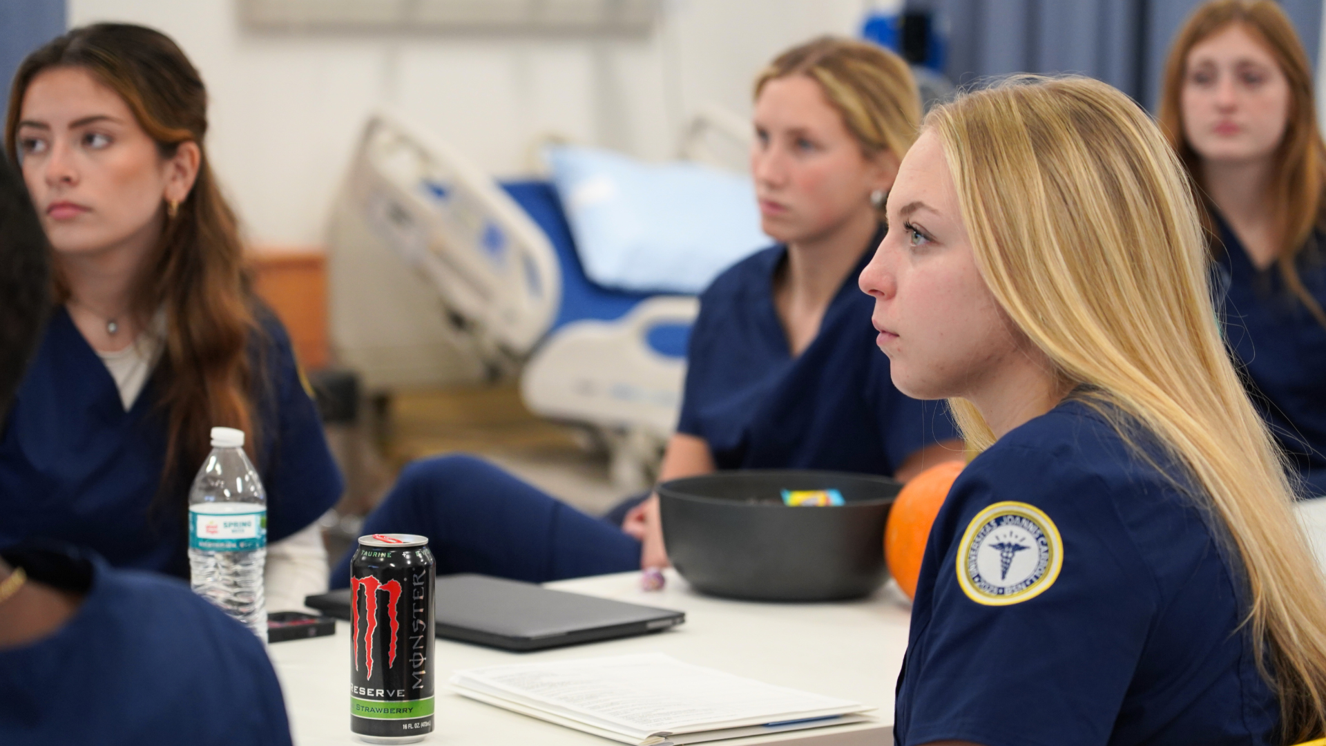 low fidelity nursing simulation lab with students in the classroom