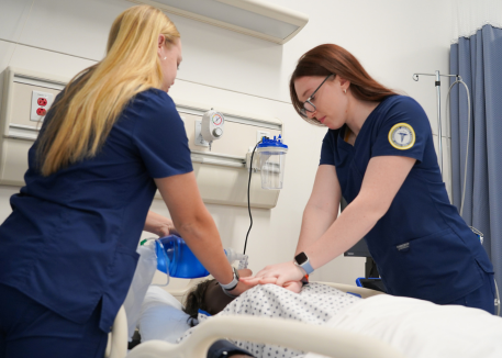 students of nursing practicing CPR