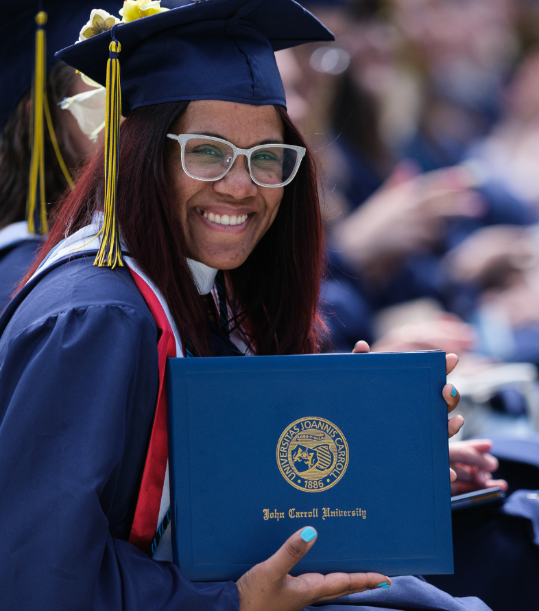 grad student at commencement ceremony