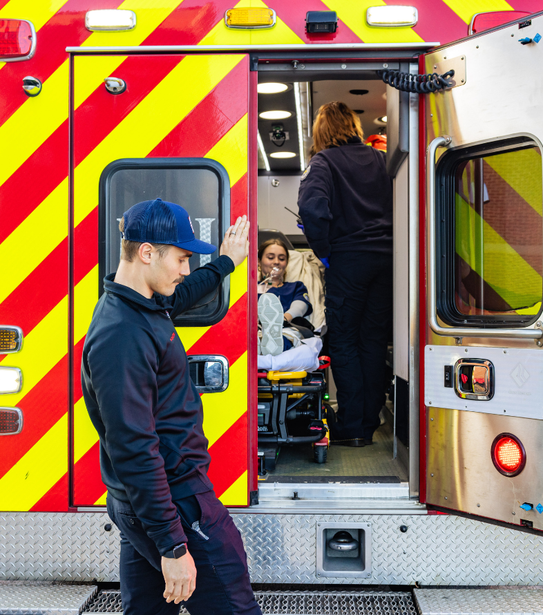 ems student closing ambulance doors