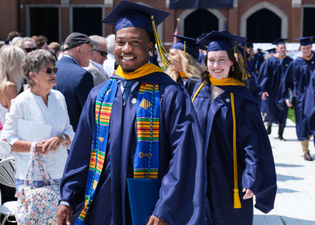 pre-health student walking at commencement