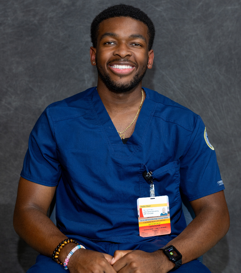 jcu student in nursing scrubs headshot