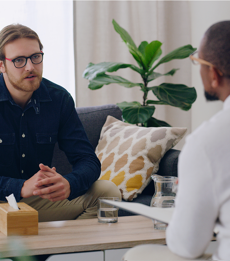 Counseling session between two males