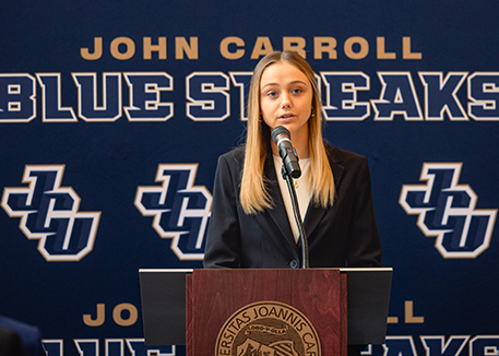 Female student at press conference for JCU athletics