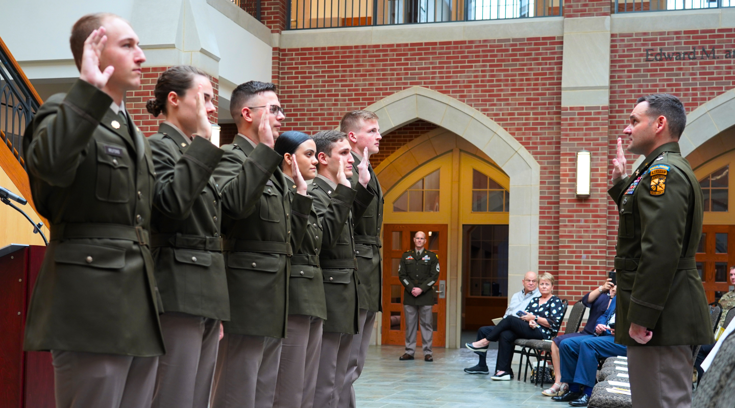 rotc commissioning ceremony cadets saluting