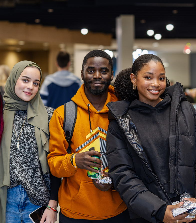 diverse students smiling at jcu unity night