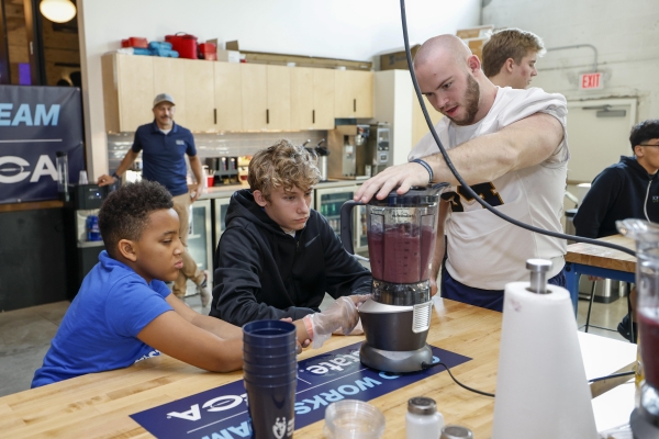 Matt Wrather '25 volunteering at Son of a Saint