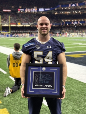 Matt Wrather '25 at the Sugar Bowl with his award