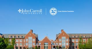 Photo of the front of John Carroll University's red brick campus. 