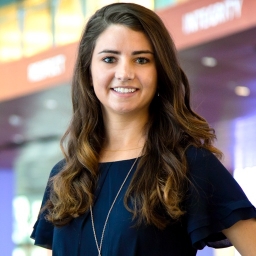 female student posing for picture smiling