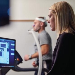 students exercising indoors