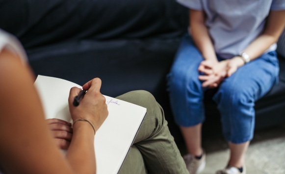 Counseling session between a female counselor and a female client