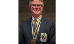 Dave Robinson Posing During the John Carroll University Alumni Medal Ceremony