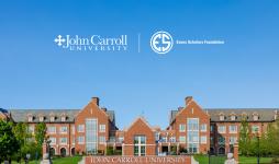 Photo of the front of John Carroll University's red brick campus. 