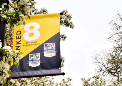 Picture of a pole banner on campus highlight John Carroll University's #8 ranking for Best Value and #8 Most Innovative Schools in U.S. News & World Report's 2019 Regional Universities Midwest region