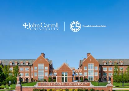 Photo of the front of John Carroll University's red brick campus. 